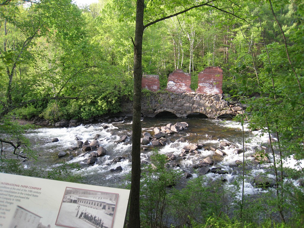 Tilton NH Rail Trail 2010 0310.jpg - Winnipesaukee River Trail, Franklin New HampshireTrestle View ParkInterested in taking a walk or bike ride on a scenic historic trail close to the downtowns of the twin rivers area, yet with the feel of wilderness. A 3 mile trail parallels the Winnipesauke river and passes the historic Sulphite upside down covered bridge believed to be the only one in the country and listed on the national register of historic places. You will also view mill ruins and remaining portions of dams that tell the history of the 5 mills that operated on this river in the mid 19th century.
